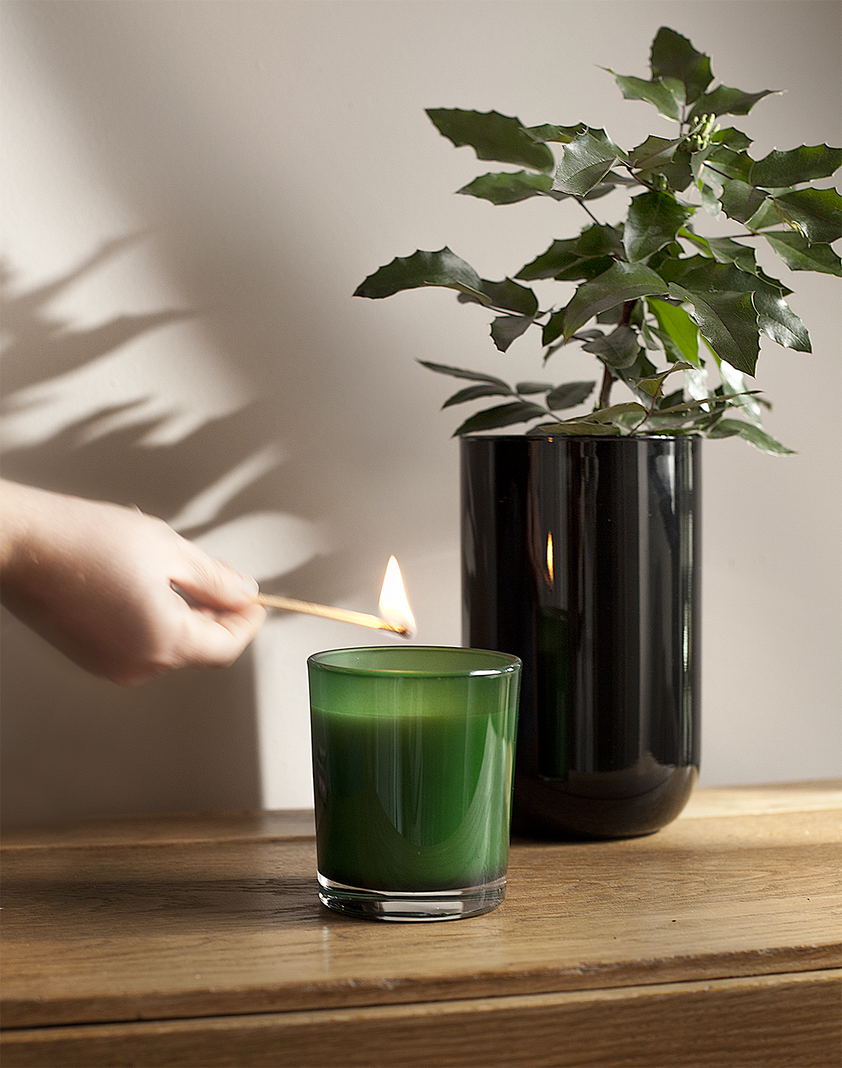 Zielony świecznik w formie szklanki