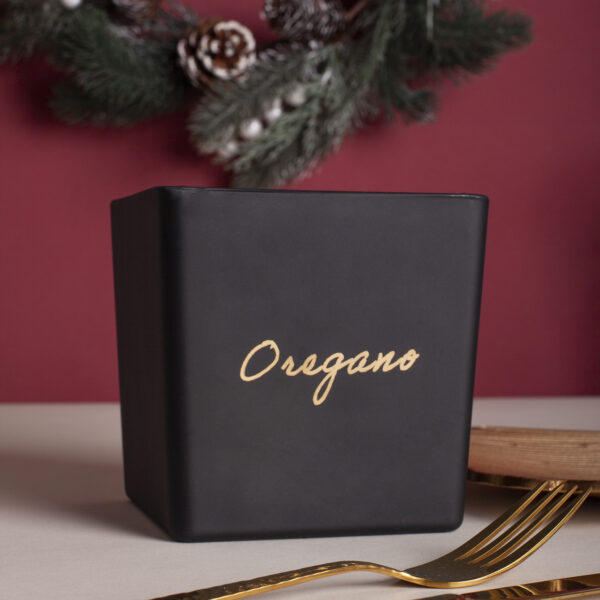 Świąteczna czarna osłonka złoty napis Oregano